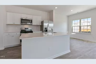 7148 Royal Ascot Drive, Whitsett, NC 27377 - Photo 9