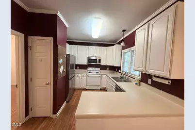 7709 Harps Mill Woods Run, Raleigh, NC 27615 - Photo 5