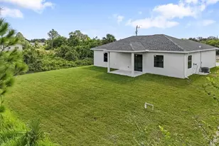 843 Theodore Vail St E, Lehigh Acres, FL 33974 - Photo 33