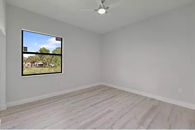 843 Theodore Vail St E, Lehigh Acres, FL 33974 - Photo 19