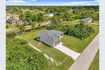 843 Theodore Vail St E, Lehigh Acres, FL 33974 - Photo 5