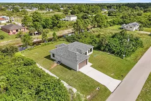 843 Theodore Vail St E, Lehigh Acres, FL 33974 - Photo 5