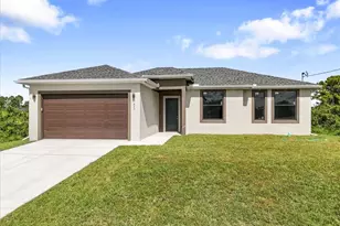 843 Theodore Vail St E, Lehigh Acres, FL 33974 - Photo 1