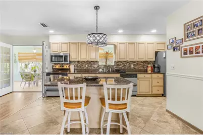 7692 Myrsine Cir, Bokeelia, FL 33922 - Photo 9