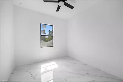 719 Fullerton Ave S, Lehigh Acres, FL 33974 - Photo 23