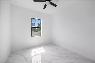 719 Fullerton Ave S, Lehigh Acres, FL 33974 - Photo 23