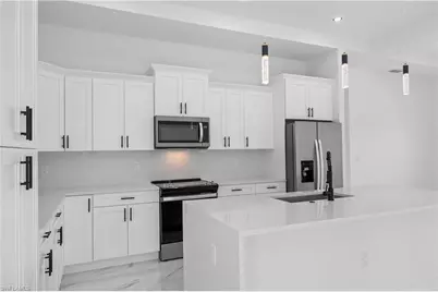 719 Fullerton Ave S, Lehigh Acres, FL 33974 - Photo 21