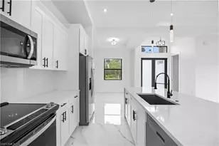 719 Fullerton Ave S, Lehigh Acres, FL 33974 - Photo 7