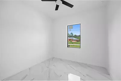 719 Fullerton Ave S, Lehigh Acres, FL 33974 - Photo 27