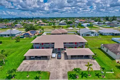 1303 SW 16th Ter #102, Cape Coral, FL 33991 - Photo 1