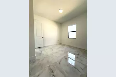 2513 19th St SW, Lehigh Acres, FL 33976 - Photo 17