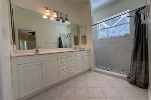 9894 Colonial Walk N, Estero, FL 33928 - Photo 17