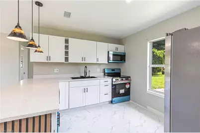 1101 Coolidge Ave, Lehigh Acres, FL 33936 - Photo 5