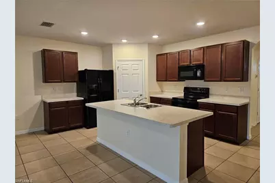 10517 Canal Brook Ln, Lehigh Acres, FL 33936 - Photo 5