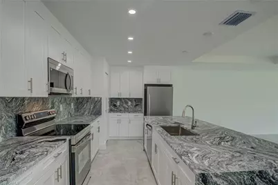 1037 Cheney Ave S, Lehigh Acres, FL 33974 - Photo 11