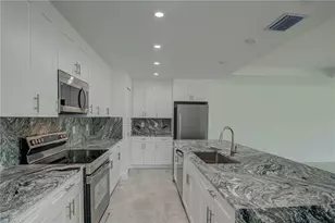 1037 Cheney Ave S, Lehigh Acres, FL 33974 - Photo 11