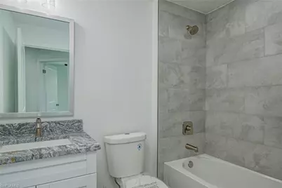 1037 Cheney Ave S, Lehigh Acres, FL 33974 - Photo 19