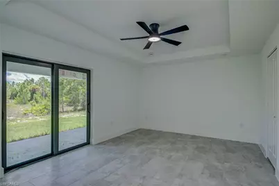 1037 Cheney Ave S, Lehigh Acres, FL 33974 - Photo 13
