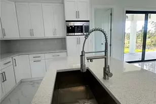 1022 Candlelight Dr, Lehigh Acres, FL 33974 - Photo 13