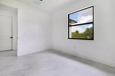 2406 Hightower Ave S, Lehigh Acres, FL 33973 - Photo 35