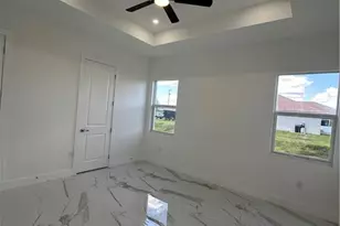 3124 35th St SW, Lehigh Acres, FL 33976 - Photo 9