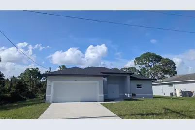 927 Bolivia Dr, Lehigh Acres, FL 33974 - Photo 1