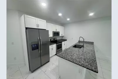 727 Gordon Ave S, Lehigh Acres, FL 33973 - Photo 3