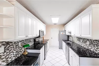 13044 Tall Pine Cir, Fort Myers, FL 33907 - Photo 9