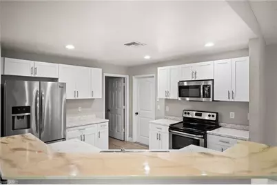 2611 4th St SW, Lehigh Acres, FL 33976 - Photo 11