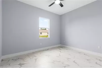 2818 42nd St SW, Lehigh Acres, FL 33976 - Photo 11