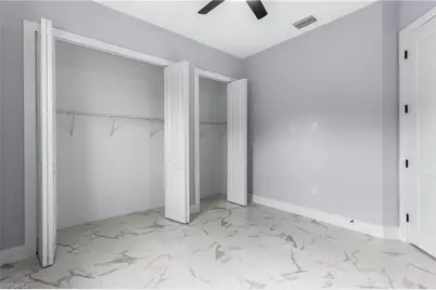 2818 42nd St SW, Lehigh Acres, FL 33976 - Photo 13