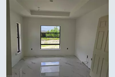 2707 30th St SW, Lehigh Acres, FL 33976 - Photo 7