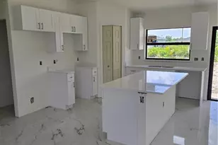 2707 30th St SW, Lehigh Acres, FL 33976 - Photo 3