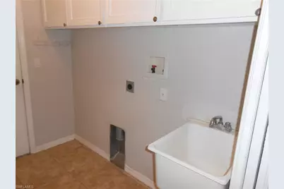 407 Chamonix Ave S, Lehigh Acres, FL 33974 - Photo 13