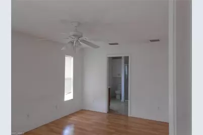 407 Chamonix Ave S, Lehigh Acres, FL 33974 - Photo 9