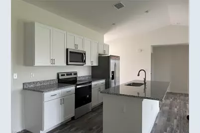 1121 NW 13th Ter, Cape Coral, FL 33993 - Photo 3