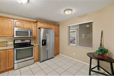 9900 Sunset Cove Ln #111, Fort Myers, FL 33919 - Photo 7