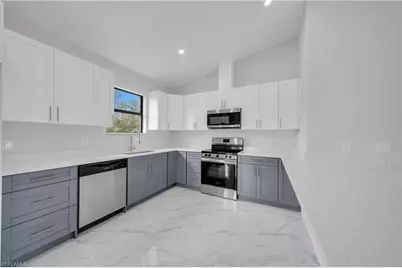 457 Woodman Dr, Lehigh Acres, FL 33972 - Photo 11