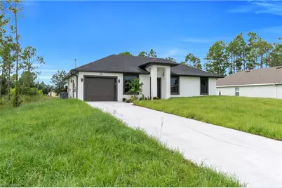 457 Woodman Dr, Lehigh Acres, FL 33972 - Photo 3
