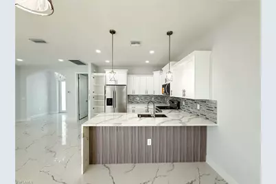 3003 20th St SW, Lehigh Acres, FL 33976 - Photo 9