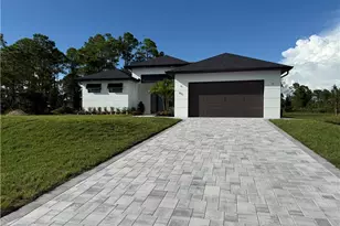 911 Asher St E, Lehigh Acres, FL 33974 - Photo 9