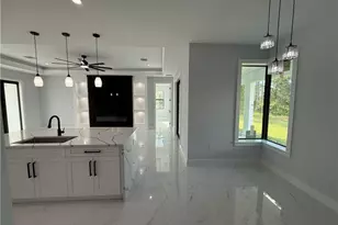 911 Asher St E, Lehigh Acres, FL 33974 - Photo 23