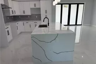 911 Asher St E, Lehigh Acres, FL 33974 - Photo 21