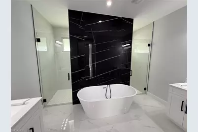 911 Asher St E, Lehigh Acres, FL 33974 - Photo 27