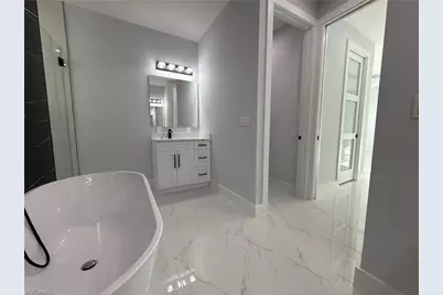 911 Asher St E, Lehigh Acres, FL 33974 - Photo 29