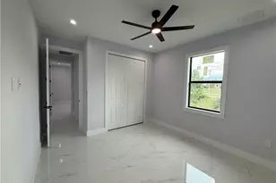 911 Asher St E, Lehigh Acres, FL 33974 - Photo 39