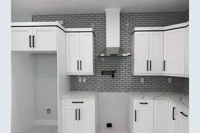 911 Asher St E, Lehigh Acres, FL 33974 - Photo 19