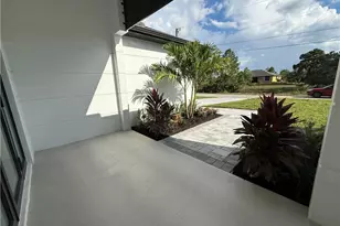 911 Asher St E, Lehigh Acres, FL 33974 - Photo 7