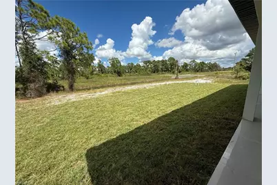 911 Asher St E, Lehigh Acres, FL 33974 - Photo 49