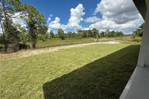 911 Asher St E, Lehigh Acres, FL 33974 - Photo 49